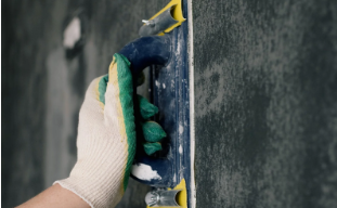 plastering a wall
